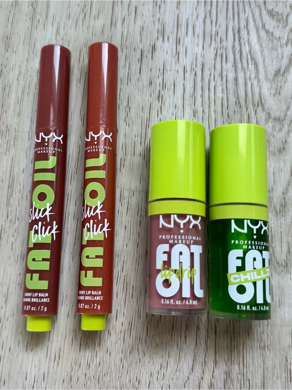 NYX Professional Makeup Fat Oil Lip Balm & Slick Click Lipsticks